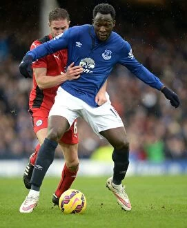 Images Dated 22nd February 2015: Intense Rivalry: Lukaku vs. Upson - A Battle for Supremacy at Goodison Park