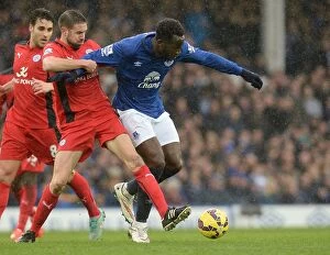 Everton v Leicester City - Goodison Park Collection: Intense Rivalry: Lukaku vs. Upson Battle at Goodison Park