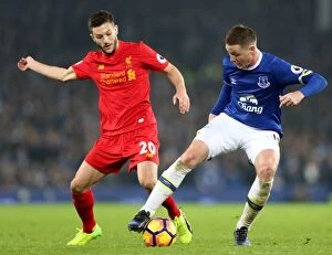 Images Dated 19th December 2016: Intense Rivalry: McCarthy vs. Lallana at Goodison Park - Everton vs. Liverpool, Premier League