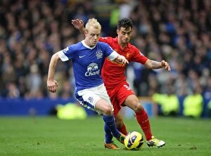 Images Dated 28th October 2012: Intense Rivalry: Naismith vs. Fernandez Battle at Goodison Park - Everton vs. Liverpool (2012)