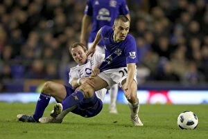 Images Dated 9th March 2011: Intense Rivalry: Osman vs. Bowyer at Goodison Park - Everton vs