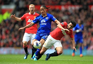 Framed Print : Intense Rivalry: Rafael Da Silva vs. Steven Pienaar - Battle for Ball Possession (Manchester United vs. Everton, Barclays Premier League, Old Trafford, 2012) Framed Print : Intense Rivalry: Rafael Da Silva vs. Steven Pienaar - Battle for Ball Possession (Manchester United vs. Everton, Barclays Premier League, Old Trafford, 2012)