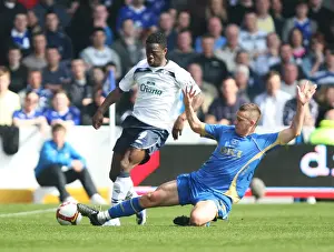 Intense Rivalry: Saha vs. Davis Clash at Fratton Park, March 2009 Premier League