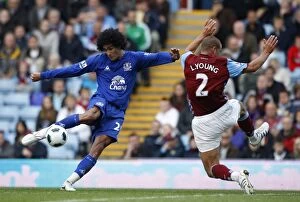 29 August 2010 Aston Villa v Everton Collection: Intense Soccer Rivalry: Fellaini vs. Young Showdown - Aston Villa vs
