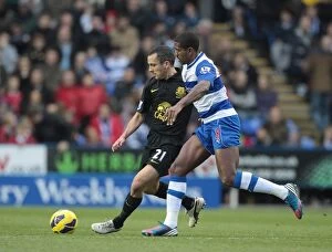 Images Dated 17th November 2012: Intense Tackle: Leon Osman vs. Mikele Leigertwood - Everton's Close Call in Reading's 1-2 Premier
