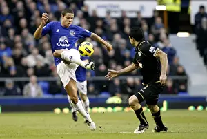 11 December 2010 Everton V Wigan Athletic Prints: Jack Rodwell vs. Antolin Alcaraz: A Battle at Goodison Park