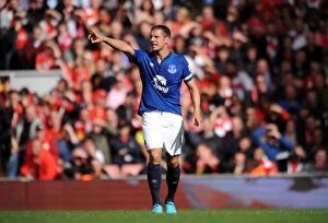 Images Dated 27th September 2014: Jagielka at Anfield: Liverpool vs. Everton, Premier League Rivalry