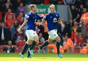 Images Dated 27th September 2014: Jagielka Scores Stunner: Everton Stuns Liverpool at Anfield, 2014 Premier League