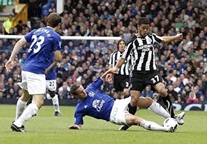 Framed Print : Jagielka vs Ben Arfa: A Battle for the Ball - Everton vs Newcastle United (Barclays Premier League, September 18, 2010)