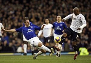 Images Dated 26th December 2007: Jagielka vs. Diouf: Everton vs. Bolton Wanderers in Premier League Clash (December 26, 2007)