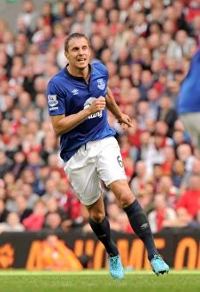 Liverpool v Everton - Anfield Collection: Jagielka's Historic Rivalry Goal: Everton's First at Anfield