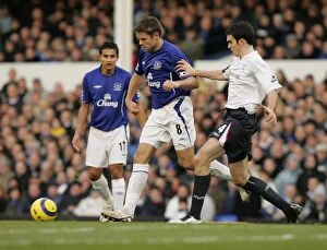 Everton vs Bolton Collection: James Beattie vs. Kevin Nolan: A Moment of Possession - Beattie Holds Off Nolan