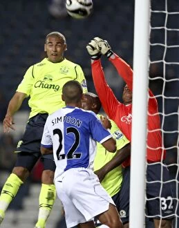 Blackburn v Everton Collection: James Vaughan vs. Jason Brown: A Battle in the Carling Cup Third Round between Blackburn Rovers