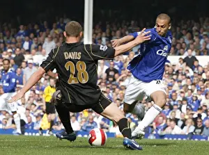 Everton V Portsmouth Prints: James Vaughan vs Sean Davis: Intense Moment at Goodison Park - Everton vs Portsmouth