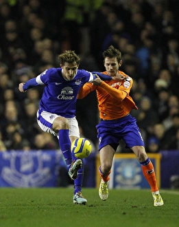 FA Cup Prints: Jelavic vs Grounds: Battle for FA Cup Possession at Goodison Park (Everton 3-1 Oldham Athletic)