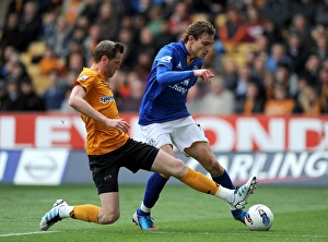 06 May 2012 V Wolverhampton Wanderers, Molineux Stadium Prints: Jelavic vs. Stearman: A Tense Showdown in the Everton vs