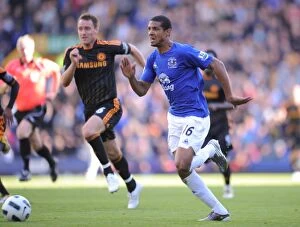 Images Dated 22nd May 2011: Jermaine Beckford's Last-Minute Thriller: Outrunning John Terry to Secure Everton's Victory over