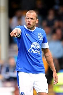 Images Dated 21st July 2012: John Heitinga Leads Everton in Pre-Season Clash at Fir Park Stadium Against Motherwell