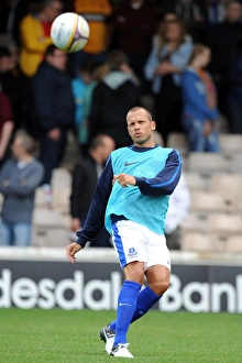 Season 2012-13 Prints: John Heitinga Leads Everton in Pre-Season Friendly at Fir Park Stadium