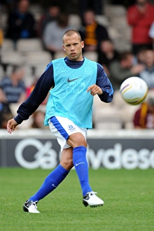 Season 2012-13 Prints: John Heitinga Leads Everton in Pre-Season Friendly at Fir Park Stadium