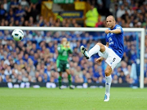 John Heitinga's Intense Performance: Everton vs. Wolverhampton Wanderers, Premier League 2010-11 (Everton at Goodison Park)