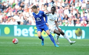 Swansea City V Everton - Liberty Stadium Prints: John Stones vs. Antonio Rodriguez: A Premier League Showdown at Swansea City's Liberty Stadium - Everton vs