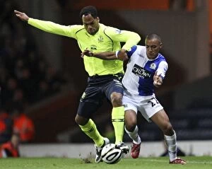 Images Dated 24th September 2008: Joleon Lescott vs. Danny Simpson: Clash in the Carling Cup Third Round - Everton vs