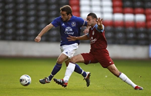 Framed Print : Jose Baxter vs. Aston Villa: Everton's Star Midfielder Faces Off in Barclays Premier Reserve League at Halton Stadium Framed Print : Jose Baxter vs. Aston Villa: Everton's Star Midfielder Faces Off in Barclays Premier Reserve League at Halton Stadium