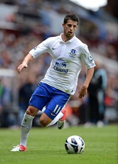 Images Dated 25th August 2012: Kevin Mirallas Scores the Game-Winning Goal: Everton's 3-1 Triumph over Aston Villa