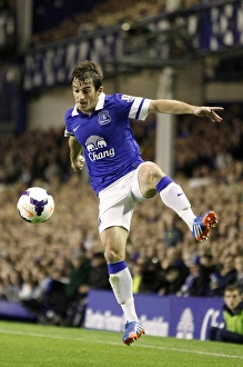 Season 2013-14 Prints: Leighton Baines in Action: Everton's Thrilling 3-2 Victory Over Newcastle United (September 30)