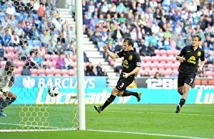 Wigan Athletic 2 v Everton 2 : DW Stadium : 06-10-2012 Collection: Leighton Baines Saves the Day: Dramatic Penalty Secures 2-2 Draw for Everton against Wigan Athletic