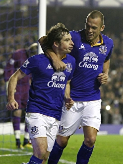 Leighton Baines Scores and Celebrates with Heitinga: Everton's Penalty Goal vs. Wolverhampton Wanderers (Nov 2011)