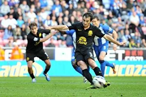 Images Dated 6th October 2012: Leighton Baines Scores Penalty: Everton's Dramatic Equalizer in 2-2 Draw vs