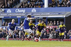 Images Dated 16th February 2014: Leighton Baines Scores the Penalty: Everton's Game-Changing Goal in FA Cup Fifth Round vs Swansea