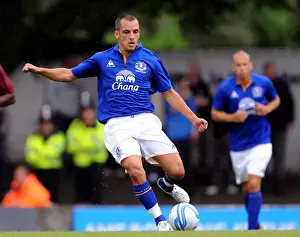 Framed Print : Leon Osman in Action: Everton's Pre-Season Battle against Bury (15 July 2011) Framed Print : Leon Osman in Action: Everton's Pre-Season Battle against Bury (15 July 2011)