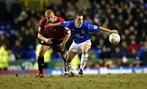 Images Dated 27th May 2005: Leon Osman gets the better of Wes Brown
