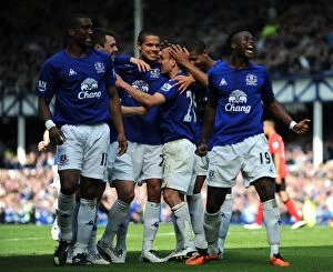 Images Dated 16th April 2011: Leon Osman Scores First Goal: Everton's Thrilling Moment vs. Blackburn Rovers in Barclays Premier
