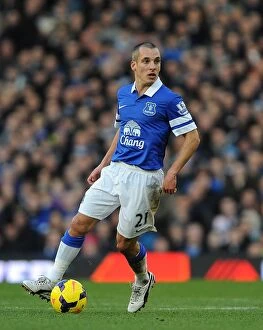 Images Dated 11th January 2014: Leon Osman Scores the Winning Goal: Everton's 2-0 Victory over Norwich City (BPL 2013-2014)