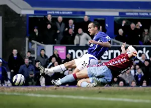 Leon Osman Slides In to Score Everton's Third Goal Against Aston Villa