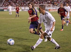 Images Dated 21st July 2007: Leon Osman vs. Real Salt Lake: Intense Battle for the Ball - Everton's Midfielder Fights for