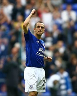 Images Dated 7th May 2011: Leon Osman's Euphoric Moment: Everton's Victory Over Manchester City (07 May 2011, Goodison Park)