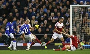 Everton 4 v Fulham 1 : Goodison Park : 14-12-2013 Collection: Leon Osman's Opening Goal: Everton's Triumph Over Fulham in Barclays Premier League (14-12-2013)