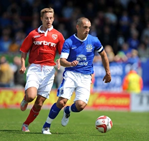Leon Osman's Powerful Run: Everton Star Overpowers Morecambe Midfield in Pre-Season Friendly