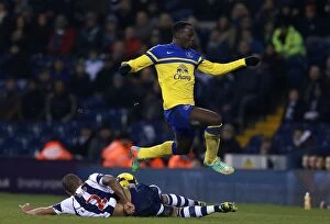 Images Dated 20th January 2014: Lukaku Soars Over Reid: Everton vs. West Bromwich Albion, 20-01-2014