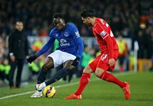 Images Dated 7th February 2015: Lukaku vs. Can: The Intense Rivalry - Everton vs. Liverpool at Goodison Park