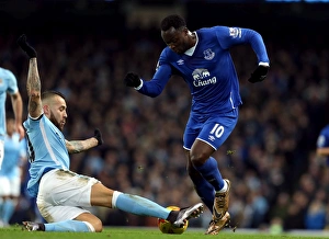 Capital One Cup Prints: Lukaku vs. Otamendi: A Football Rivalry Unfolds in the Capital One Cup Semi-Final at Etihad Stadium
