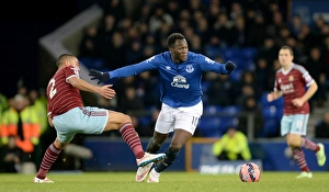 FA Cup - Third Round - Everton V West Ham United - Goodison Park Prints: Lukaku vs Reid: FA Cup Third Round Battle at Goodison Park - Everton vs West Ham
