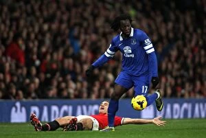 Manchester United 0 v Everton 1 : Old Trafford : 04-12-2013 Collection: Lukaku's Triumph: Outmuscling Vidic (1-0) - Everton's Victory at Old Trafford