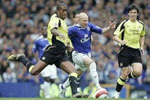 Everton v Manchester City Collection: Manchester Citys Sylvain Distin battles with Evertons Andrew Johnson