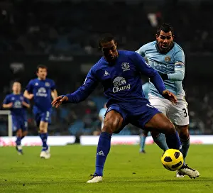 Manchester Derby Showdown: Distin vs Tevez - A Football Rivalry